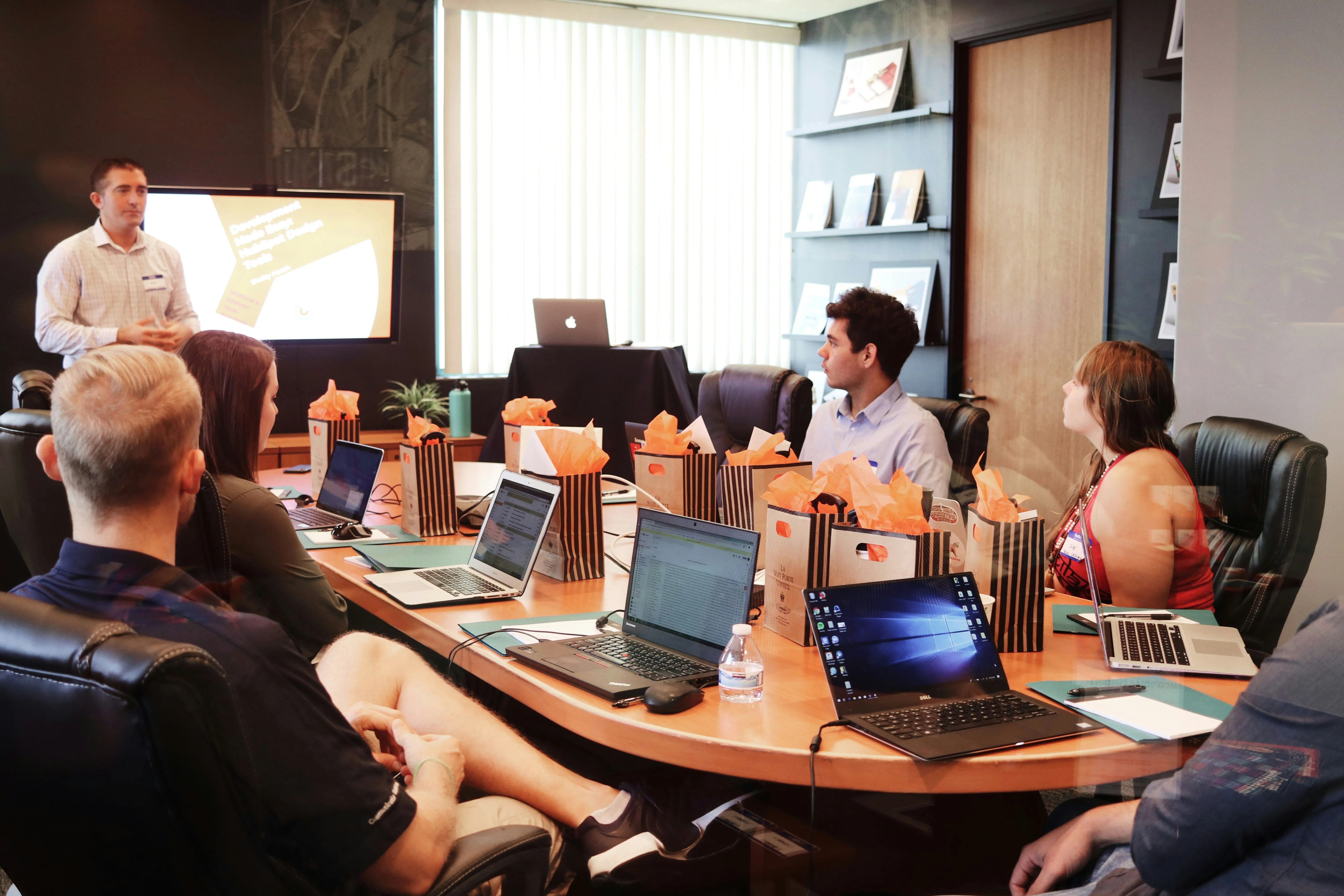 group of people using laptops