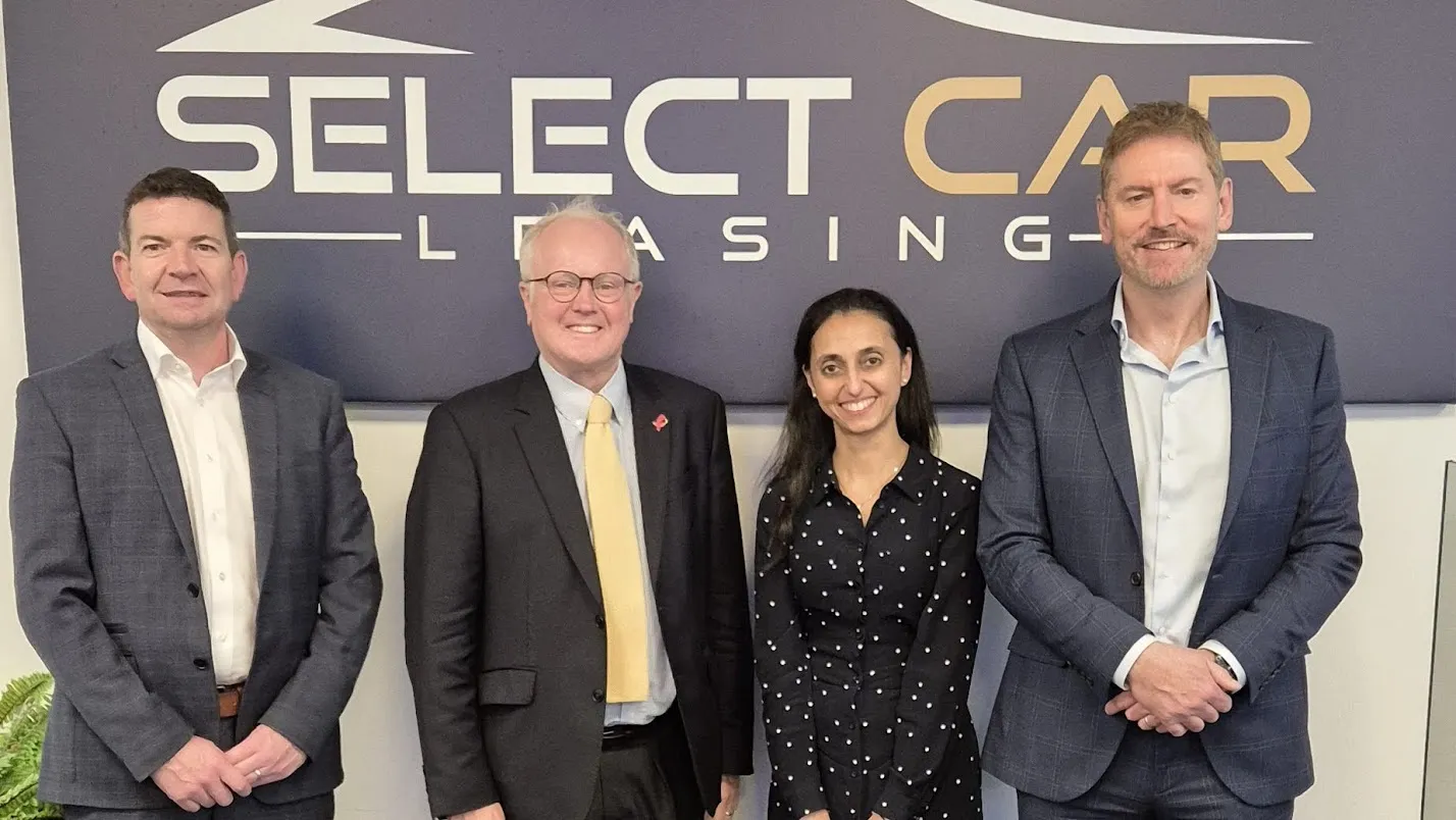BVRLA's Zohra Chagani stands alongside the Select Car Leasing team and Clive Jones MP at Select Car Leasing's offices
