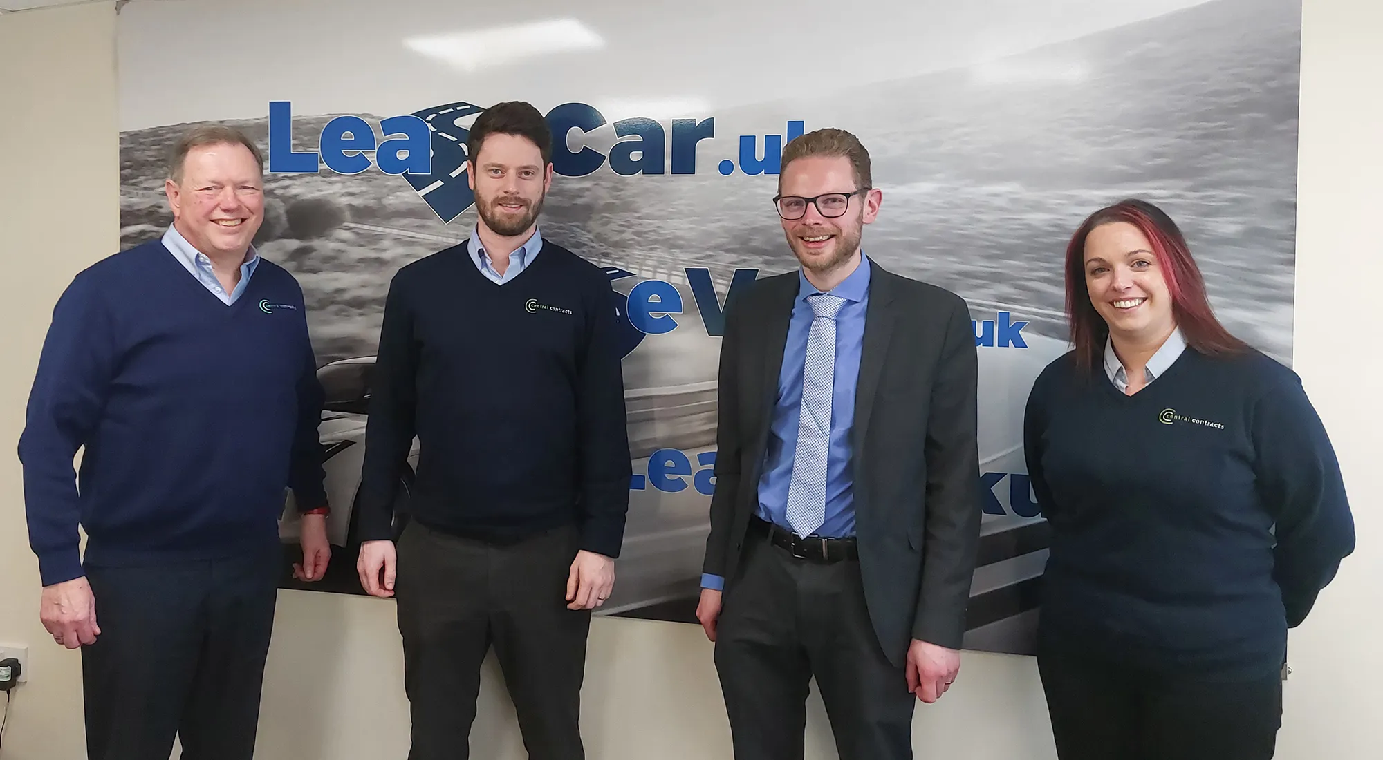 Staff members at Central Contracts hosting Jack Brereton in their office in Stoke-on-Trent