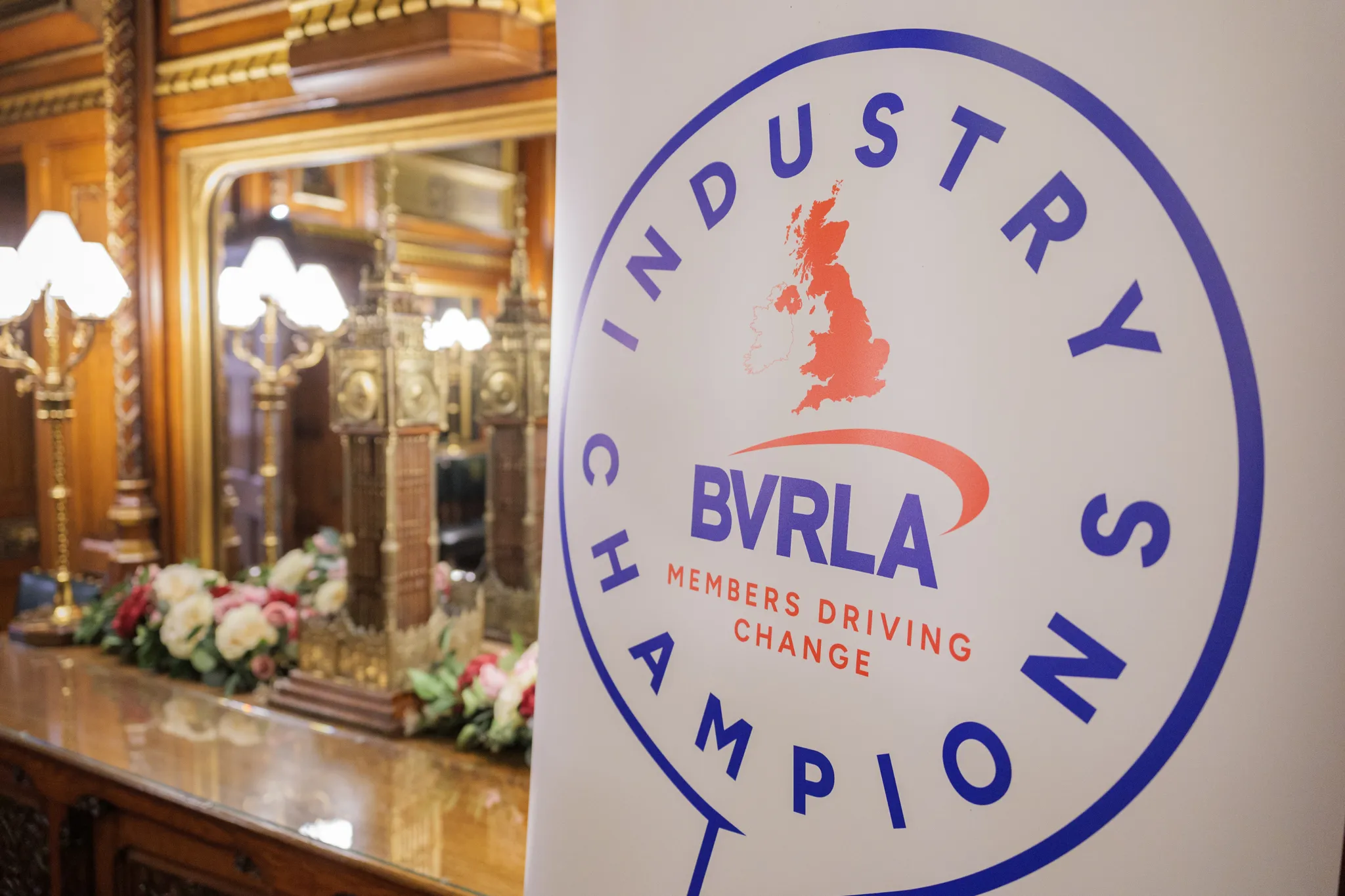 Industry Champions logo on banner at Parliamentary event for Industry Champions