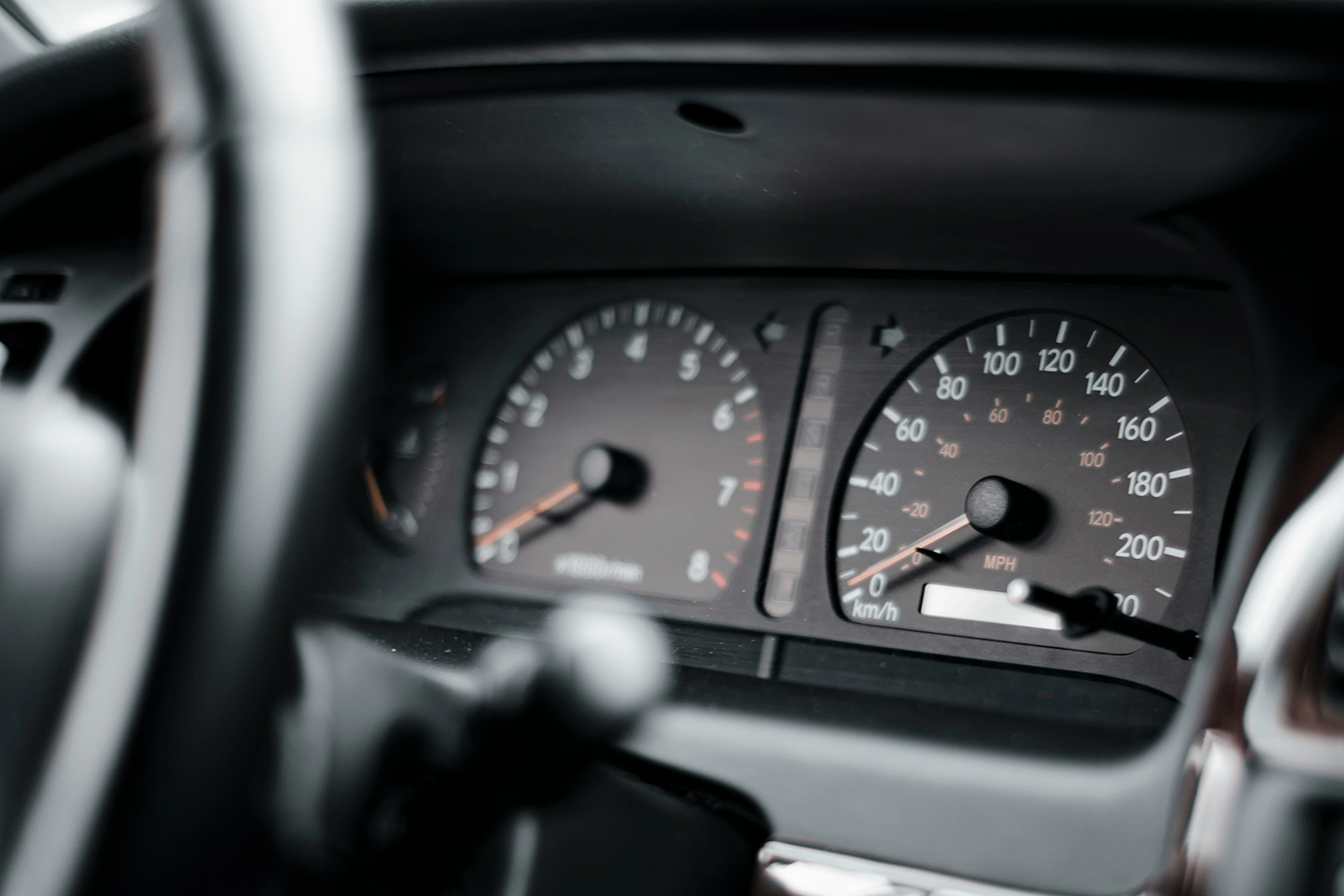 internal shot of vehicle, depicting the display of mileage and speed